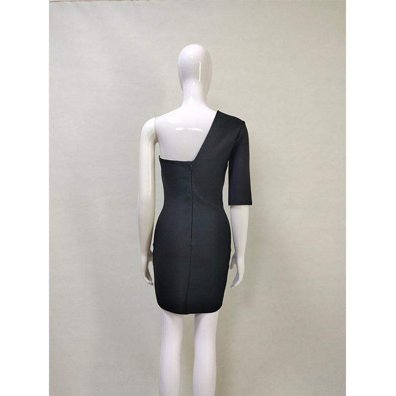 A photo from behind of a mannequin wearing a Fashion Custom Designed Black and White dress.