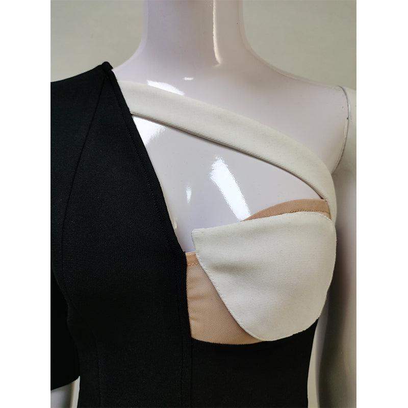 Another close up photo of the mannequins upper area wearing a Fashion Custom Designed Black and White dress.